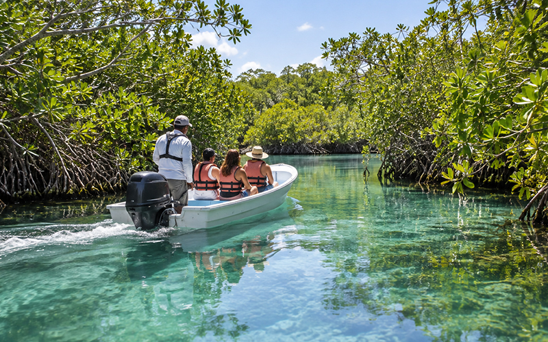 Boat navigating the Muyil canals in Sian Ka'an