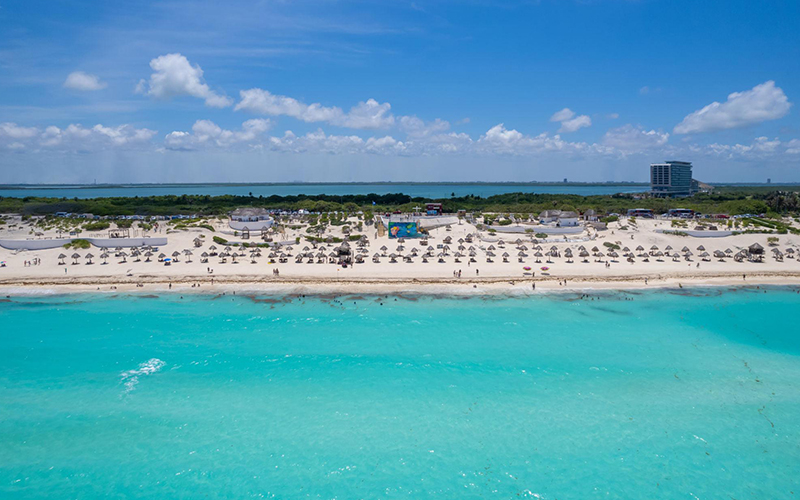 Aerial view of Playa Delfines in Cancun with turquoise waters