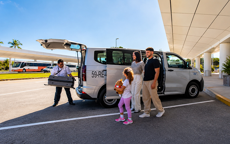 Family traveling in private transportation during their vacation in Cancun